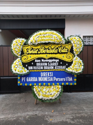 Papan Bunga Duka di Sintung